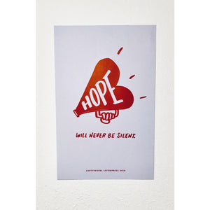 JustOne's poster with a heart megaphone with "hope will never be silent" written on it