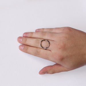 JustOne's silver ring with circle on the front, handcrafted in Kenya