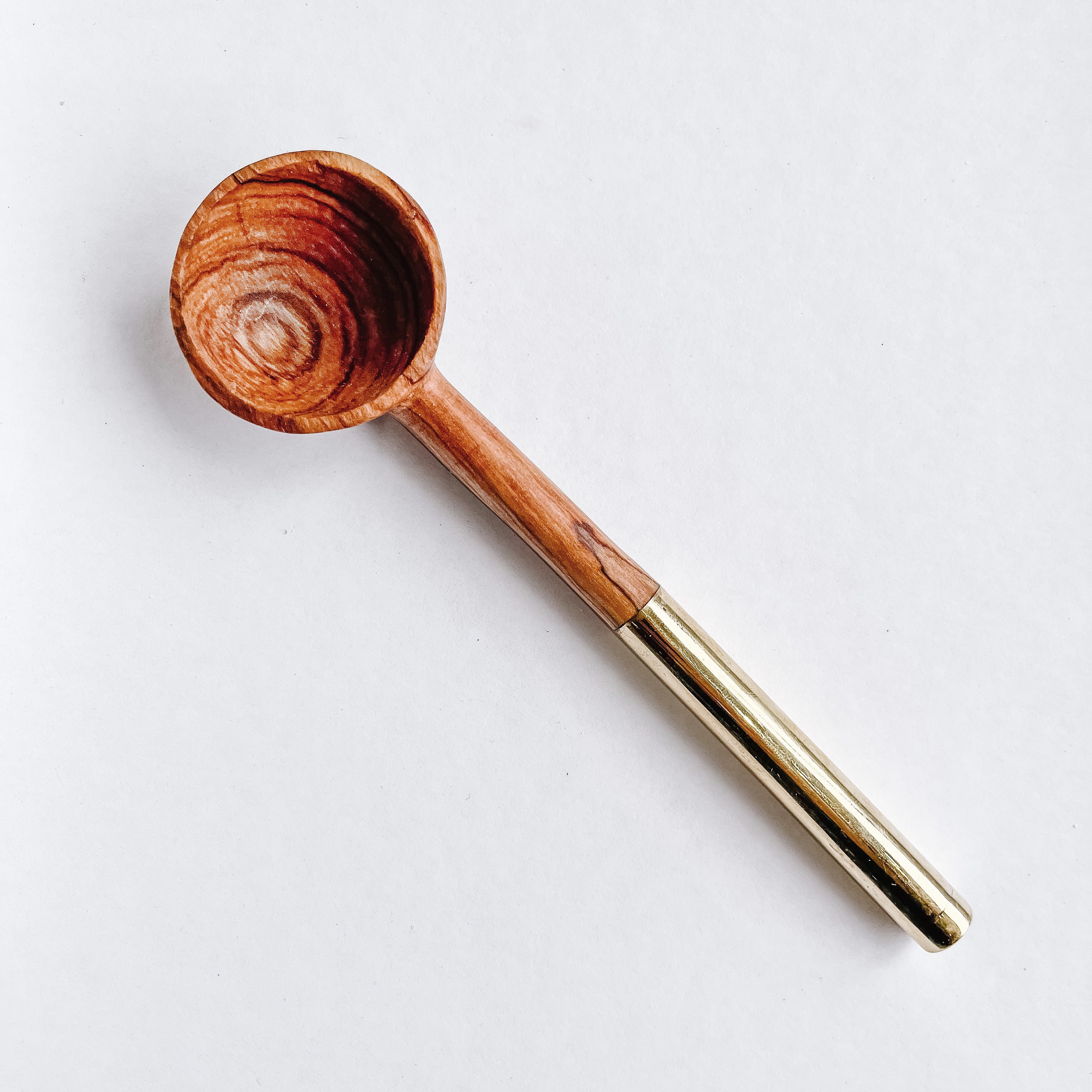 JustOne's small handcrafted, wooden, coffee spoon with handle made of recycled brass, made in Kenya