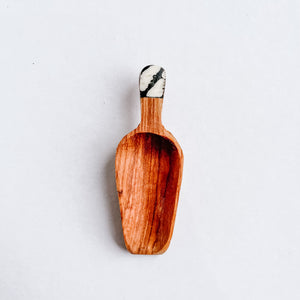 JustOne's four inch wooden scoop with handle made of ethically sourced bone, handcrafted in Kenya