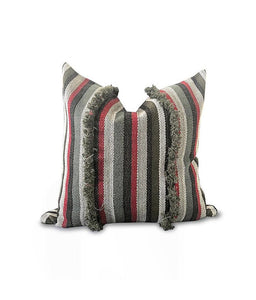 JustOne;s pillow case with different green stripes and a few red stripes and some fringe, locally crafted